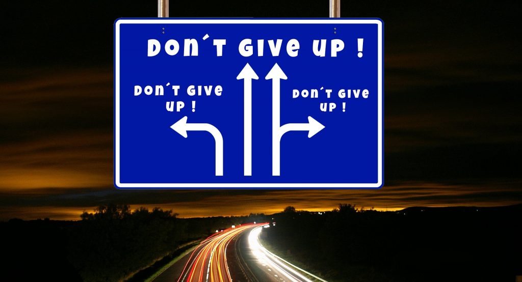 Road sign pointing towards options
